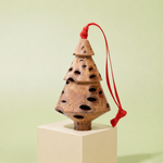 Handcrafted Banksia seed pod tiered Christmas tree decoration with red ribbon on sage green